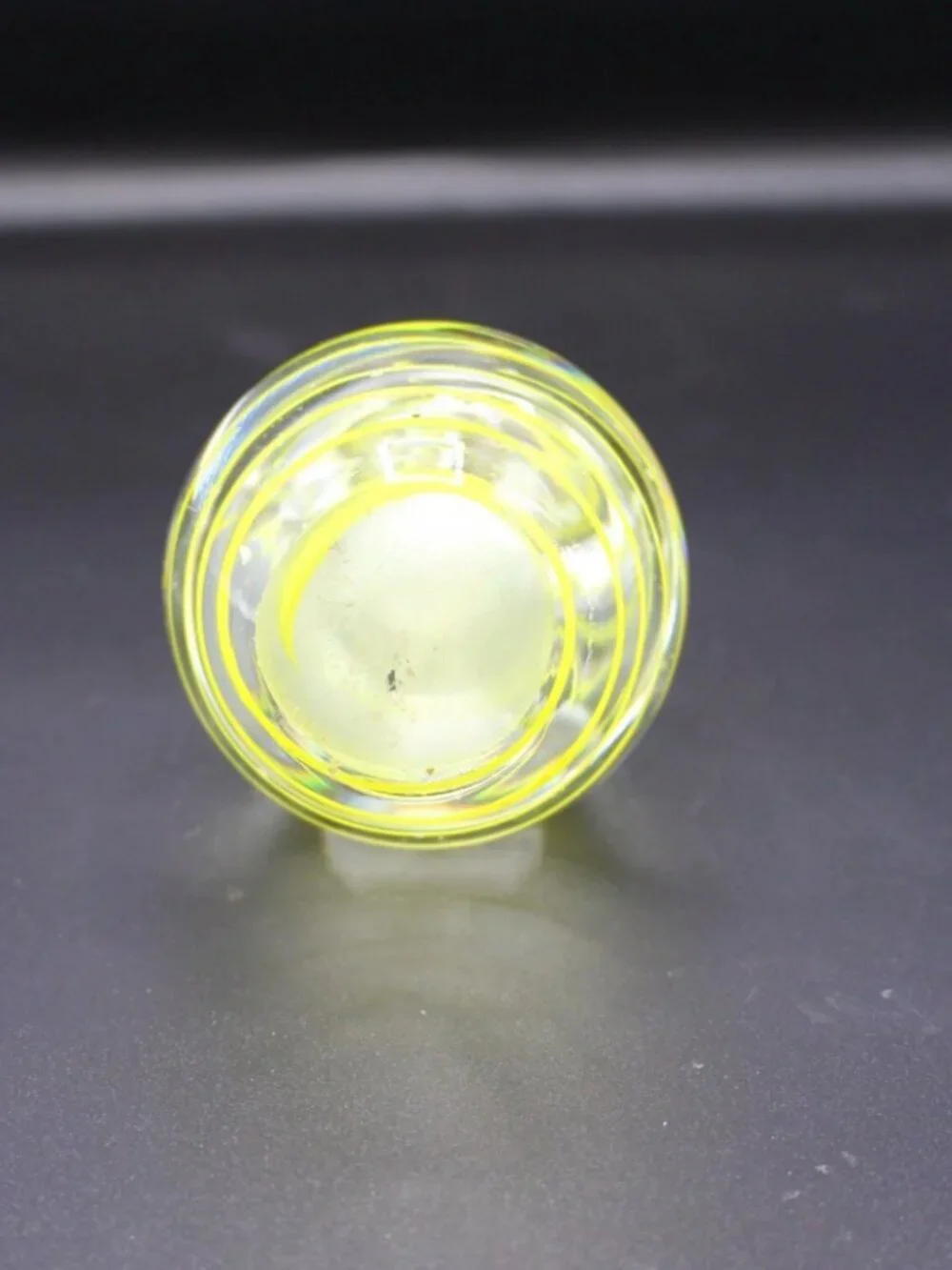 Egg-Shaped Art Glass Paperweight with Yellow Swirl